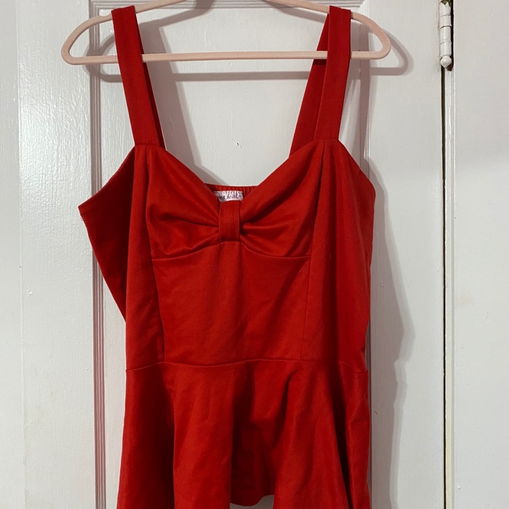 Peplum red tank